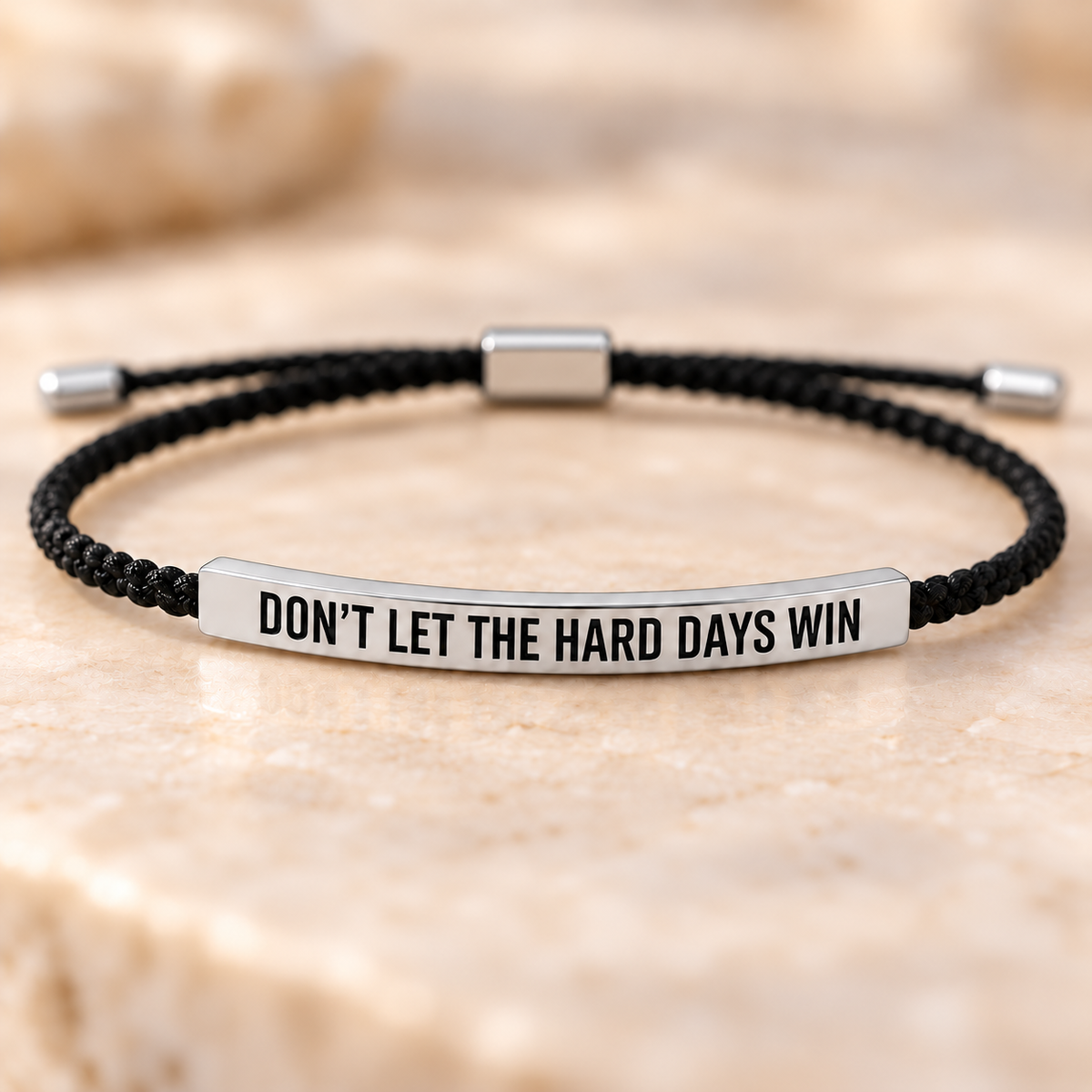 Kracht armband met boodschap – zwart, zilver
